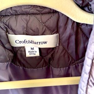 Women’s gray puffer jacket.